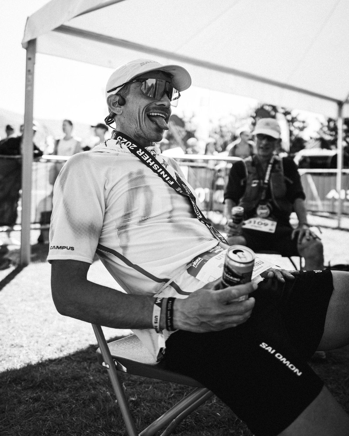 Ultra runner met by crew at an aid station during UTS